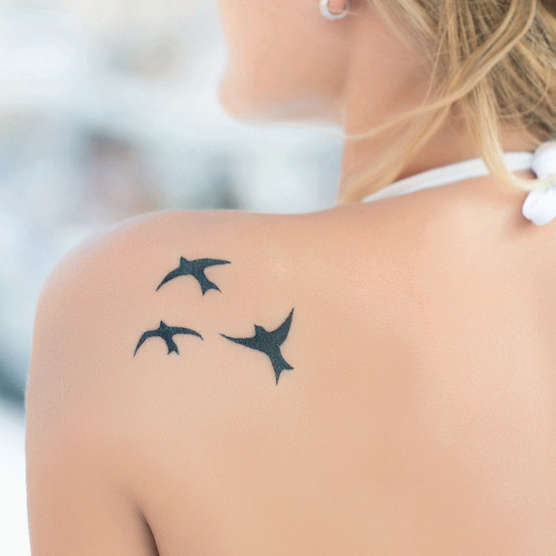 ad tattoos woman shoulder birds square 2021