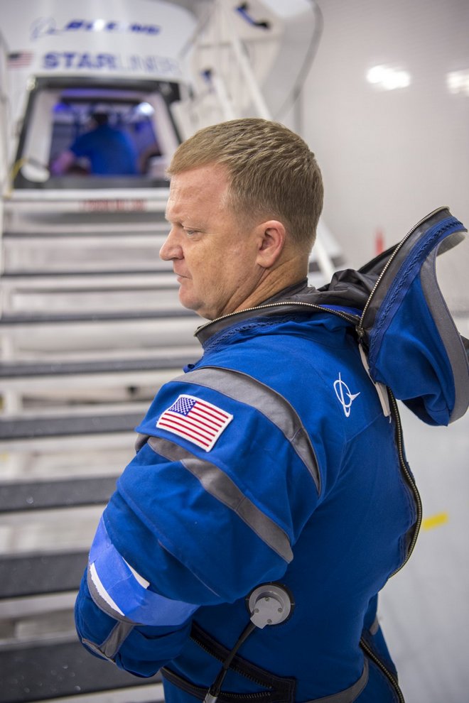 a boeing worker works with boe during a test